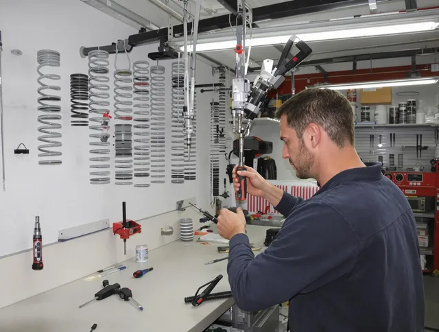 Pembroke Garage Door Repair safety certified technician performing precision spring replacement in Pembroke